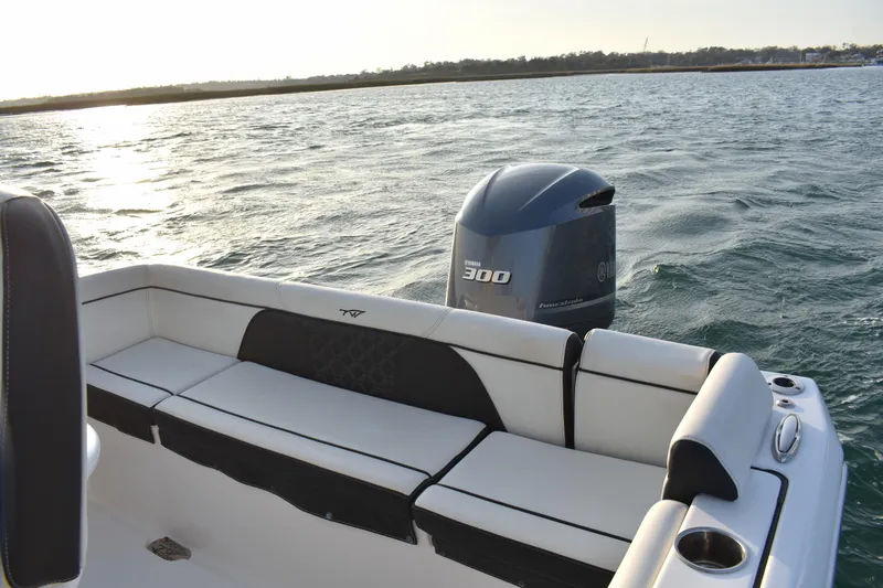 Slide: The Image of 2021 Tidewater 232 LXF boat with Yamaha 300 engine on open water. - 12