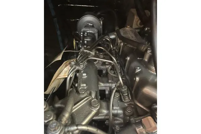 Slide: The Image of Engine of 1995 Hunter Legend 40.5 sailboat, detailed view of mechanical components. - 30