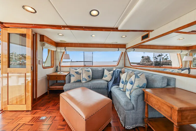 Slide: The Image of Luxurious 1970 Hargrave Yachtfisher interior with elegant wood accents and ocean views. - 27