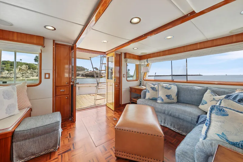 Slide: The Image of Luxurious 1970 Hargrave Yachtfisher interior with elegant wood finishes and ocean view. - 28