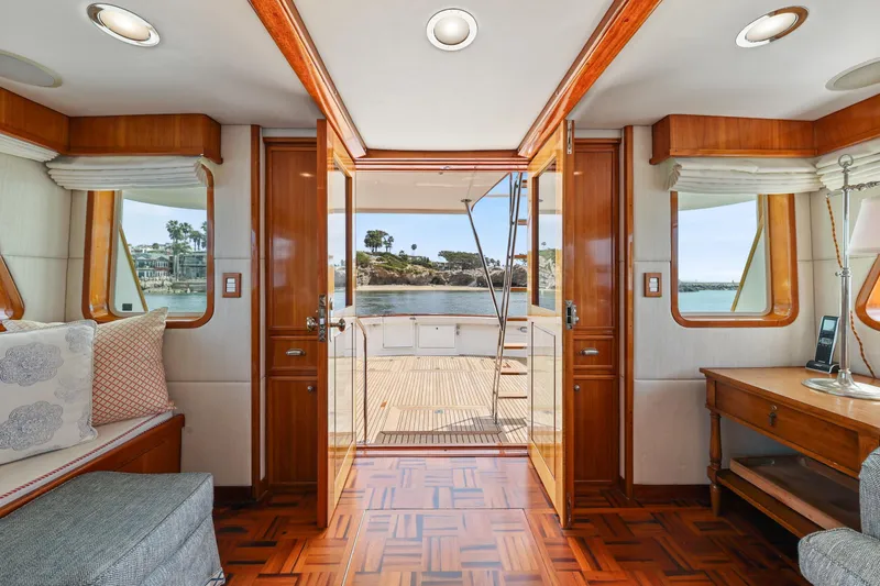 Slide: The Image of Interior of 1970 Hargrave Yachtfisher with wooden accents and ocean view. - 29