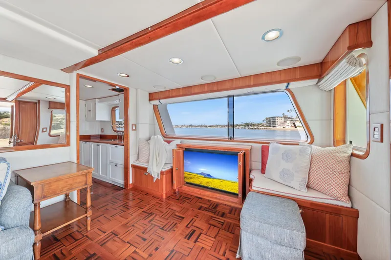 Slide: The Image of Interior of 1970 Hargrave Yachtfisher with elegant wood finishes and scenic window view. - 30