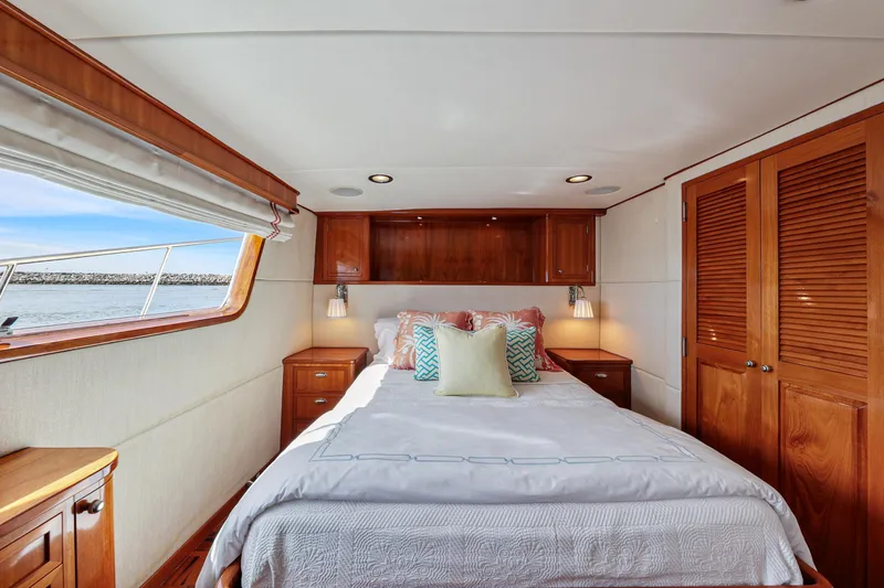 Slide: The Image of Luxurious 1970 Hargrave Yachtfisher bedroom with wood accents and ocean view. - 38