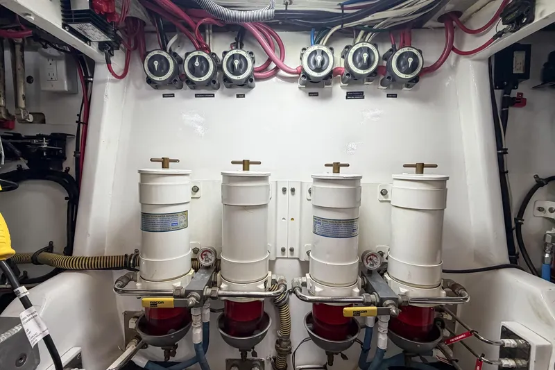 Slide: The Image of Engine room of 1970 Hargrave Yachtfisher with fuel filters and gauges. - 73