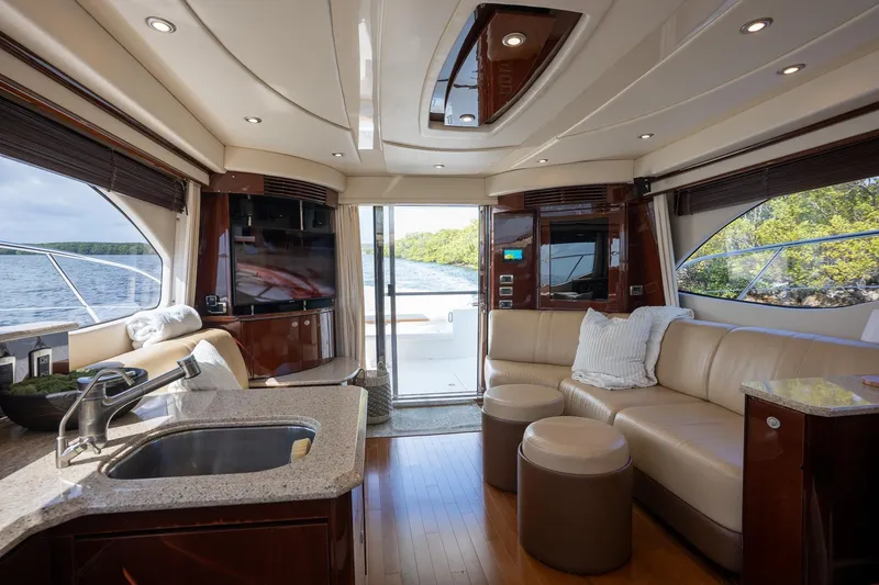 Slide: The Image of Luxurious interior of 2008 Sea Ray 520 Sedan Bridge yacht with elegant seating and modern amenities. - 16