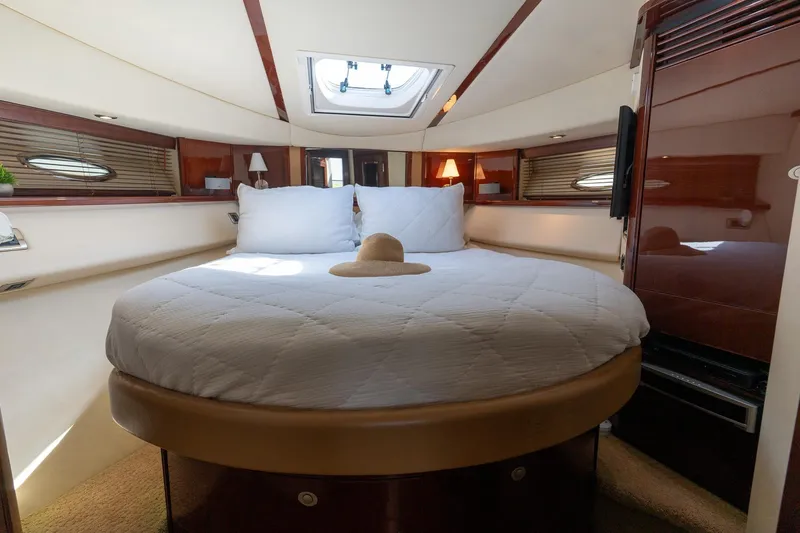 Slide: The Image of Luxurious bedroom interior of 2008 Sea Ray 520 Sedan Bridge yacht. - 19