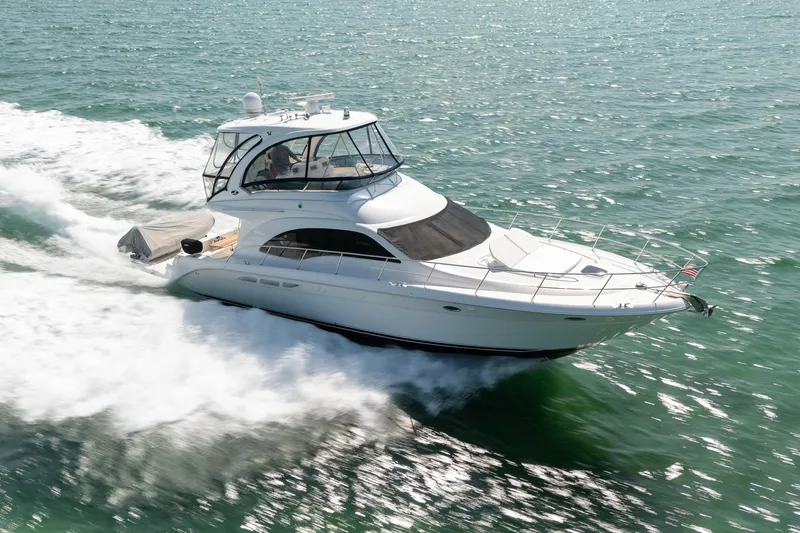 Slide: The Image of 2008 Sea Ray 520 Sedan Bridge cruising on open water, showcasing sleek design and performance. - 8