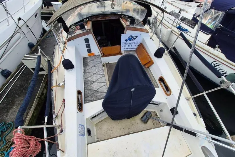 Slide: The Image of 1988 36 Catalina MK I sailboat cockpit view at marina. - 4