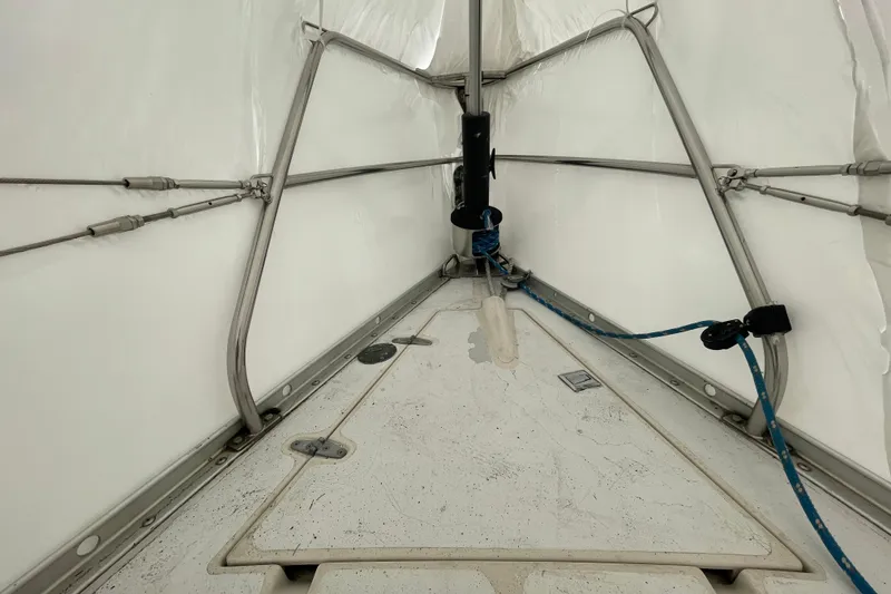 Slide: The Image of Interior view of 1985 Canadian Sailcraft CS 30 sailboat with rigging and ropes. - 15