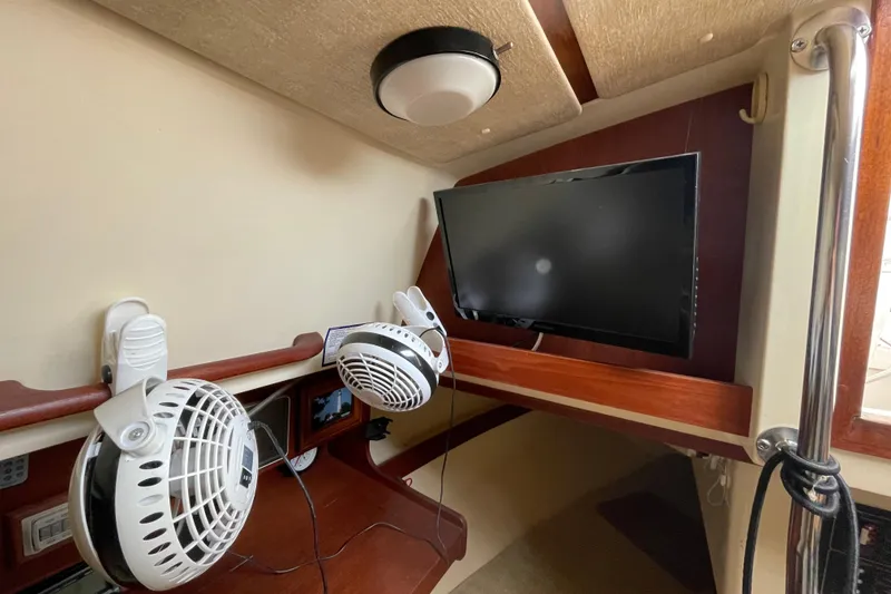 Slide: The Image of Interior of 1985 Canadian Sailcraft CS 30 with fans and mounted TV. - 21