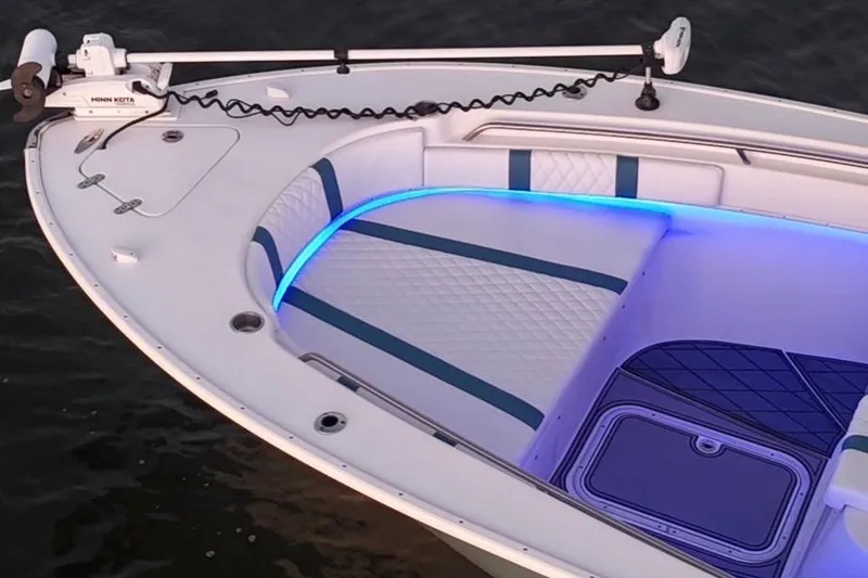 Slide: The Image of 2019 Cape Horn 27 boat with blue LED lighting and Minn Kota trolling motor. - 13