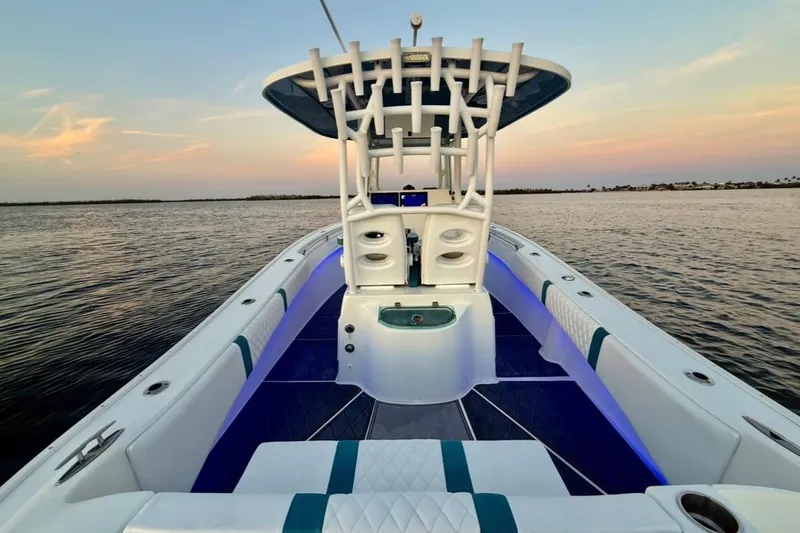 Slide: The Image of 2019 Cape Horn 27 boat interior with sunset view on the water. - 16