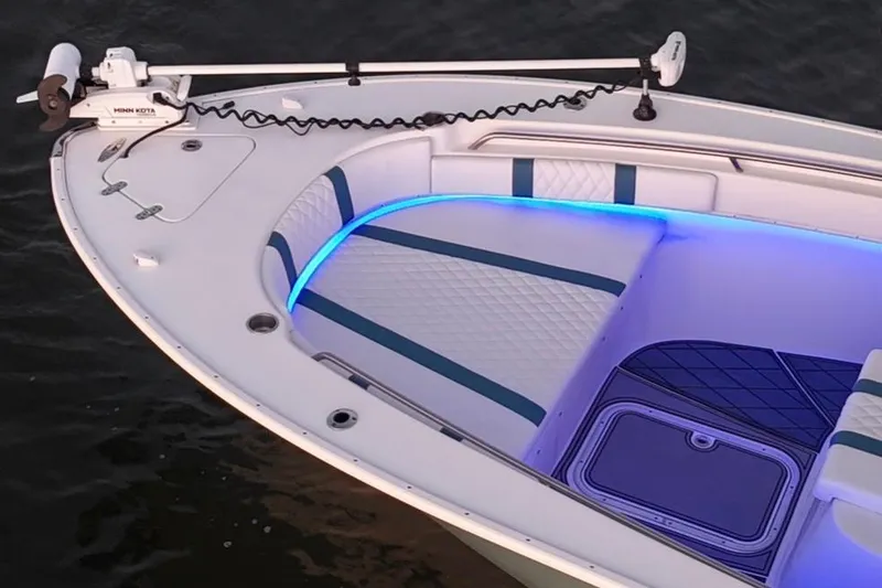 Slide: The Image of 2019 Cape Horn 27 boat with blue LED lighting and Minn Kota trolling motor. - 34