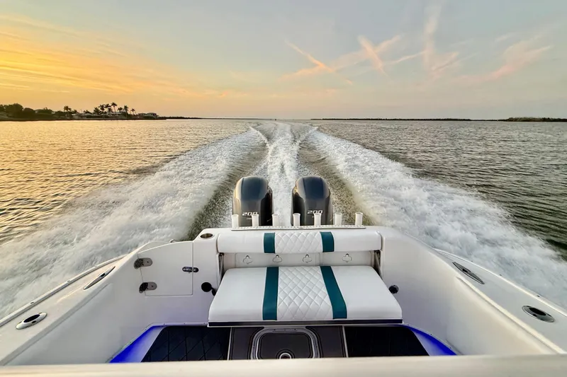 Slide: The Image of Cape Horn 27 boat cruising at sunset, 2019 model, with twin engines. - 39