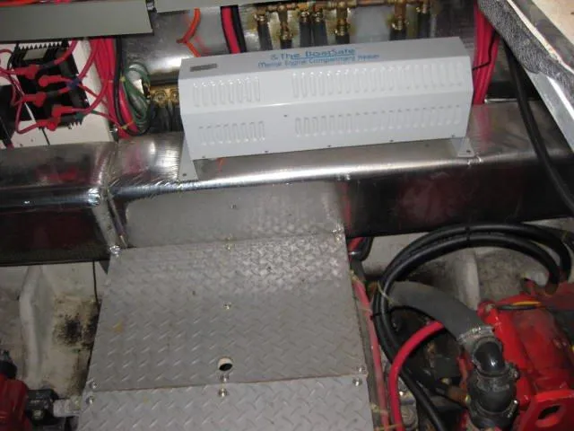 Slide: The Image of Luxurious interior of 2001 Regal Commodore 3880 yacht with plush seating and wooden table. - 17