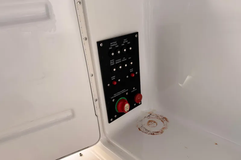 Slide: The Image of Control panel inside 2007 Glastron GS 279 boat, featuring various switches and indicators. - 35