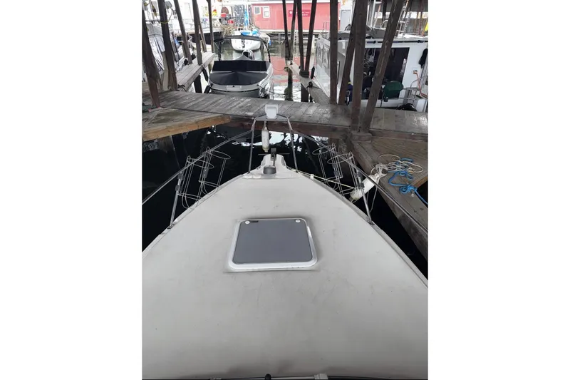 Slide: The Image of 2007 Glastron GS 279 boat docked in a marina, view from the bow. - 38