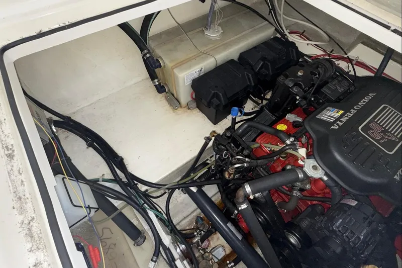 Slide: The Image of 2007 Glastron GS 279 engine compartment with Volvo Penta engine and wiring. - 40