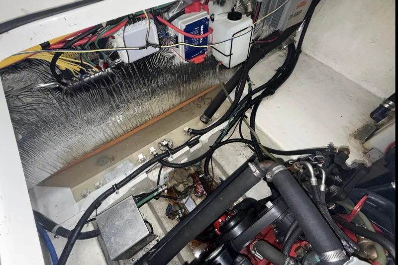 Slide: The Image of Engine compartment of a 2007 Glastron GS 279 boat, showing wiring and components. - 41