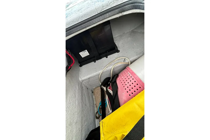 Slide: The Image of Storage compartment of 2022 Transcat 200 SVT with various equipment and gear. - 18