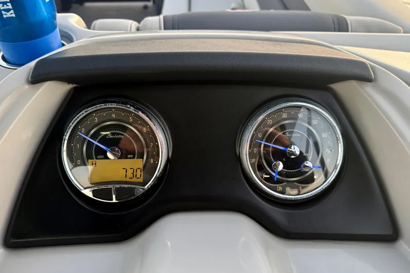Slide: The Image of Dashboard of 2024 Barletta Cabrio 24UC with RPM and speed gauges. - 3