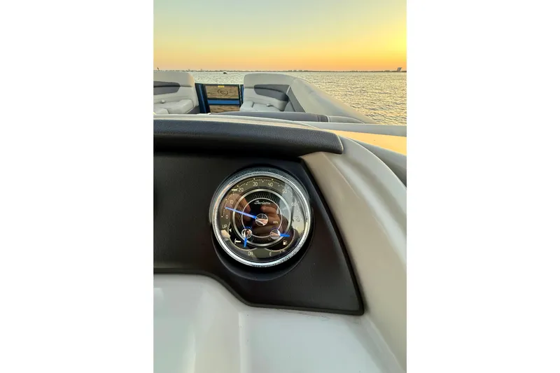 Slide: The Image of 2024 Barletta Cabrio 24UC dashboard with sunset view over water. - 4