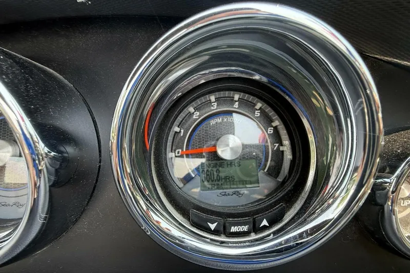 Slide: The Image of Close-up of 2016 Sea Ray SLX 250 tachometer showing 60.8 engine hours. - 21