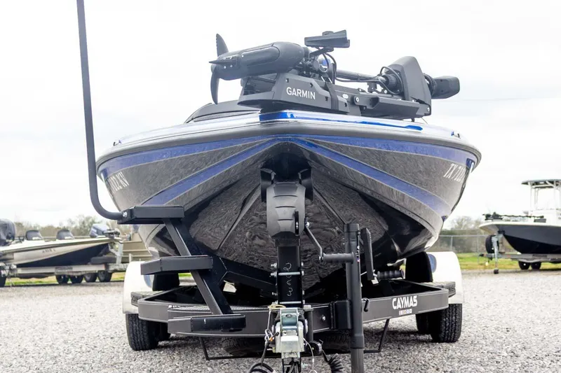 Slide: The Image of 2023 Caymas CX 21 PRO boat on trailer with Garmin equipment, front view. - 10