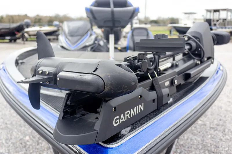 Slide: The Image of 2023 Caymas CX 21 PRO boat with Garmin trolling motor, close-up view. - 19