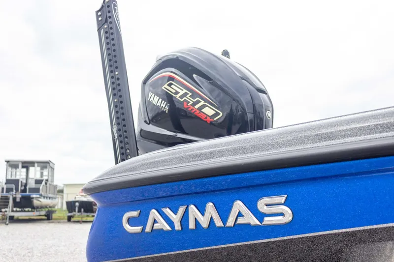 Slide: The Image of 2023 Caymas CX 21 PRO boat with Yamaha engine, blue exterior. - 24