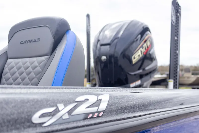 Slide: The Image of 2023 Caymas CX 21 PRO boat interior with engine detail. - 28
