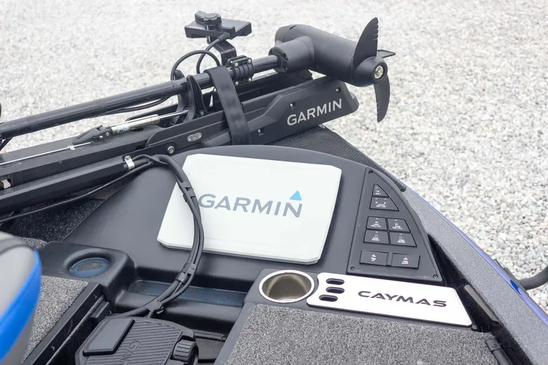 Slide: The Image of 2023 Caymas CX 21 PRO boat with Garmin navigation system and control panel. - 33
