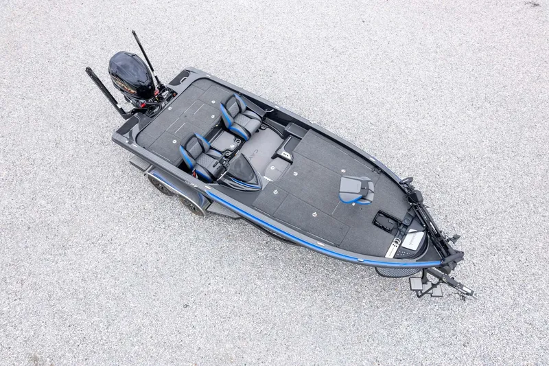Slide: The Image of 2023 Caymas CX 21 PRO bass boat, aerial view, sleek design, dual seats, powerful engine. - 58