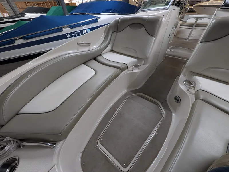 Slide: The Image of Interior of a 2006 Sea Ray 270 Sundeck boat with gray seating. - 12