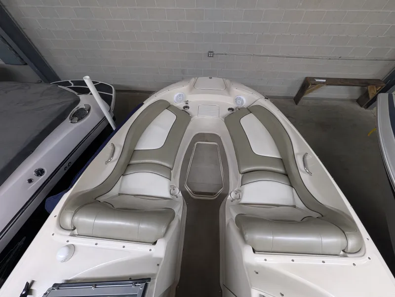 Slide: The Image of Interior of a 2006 Sea Ray 270 Sundeck boat with seating. - 13