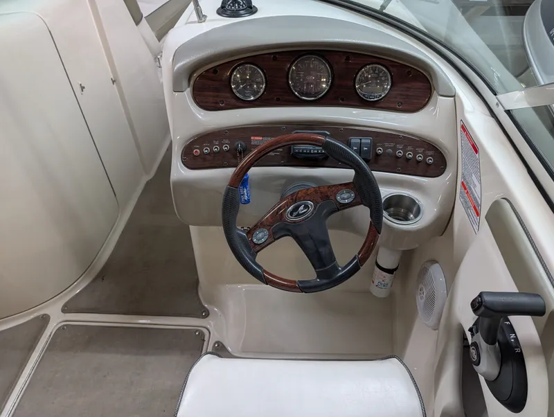 Slide: The Image of Helm console of a 2006 Sea Ray 270 Sundeck boat. - 15