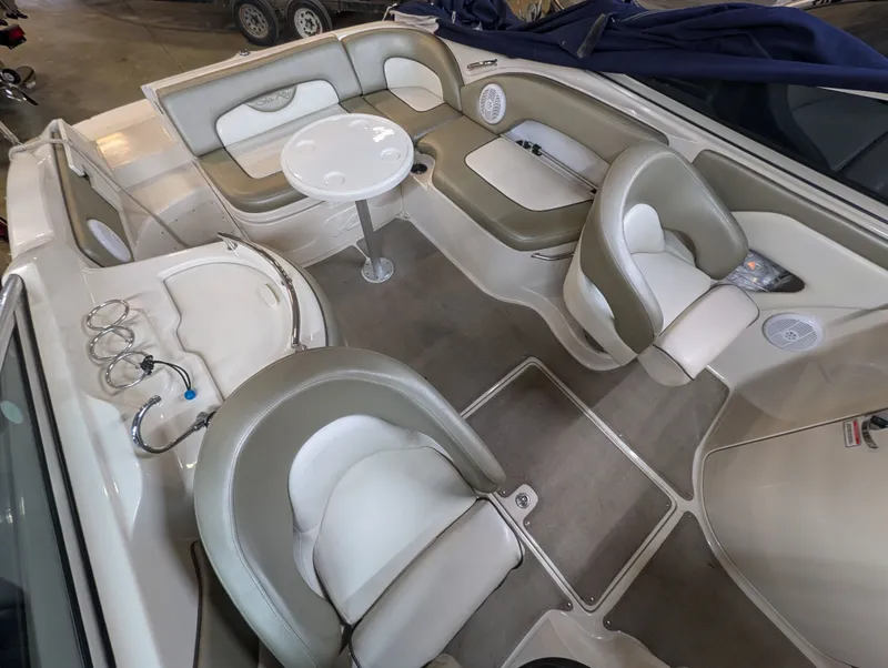 Slide: The Image of Interior of a 2006 Sea Ray 270 Sundeck boat with seating area. - 20