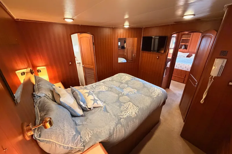 Slide: The Image of Luxurious bedroom interior of 1984 Hartman-Palmer 60 Flush Deck Motor Yacht. - 101