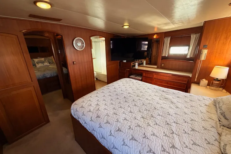 Slide: The Image of Luxurious bedroom interior of 1984 Hartman-Palmer 60 Flush Deck Motor Yacht. - 110