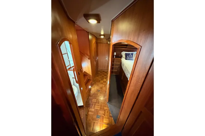 Slide: The Image of Interior of 1984 Hartman-Palmer 60 Flush Deck Motor Yacht with wooden finishes. - 124