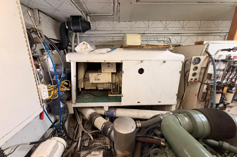 Slide: The Image of Engine room of 1984 Hartman-Palmer 60 Flush Deck Motor Yacht with generator and equipment. - 131