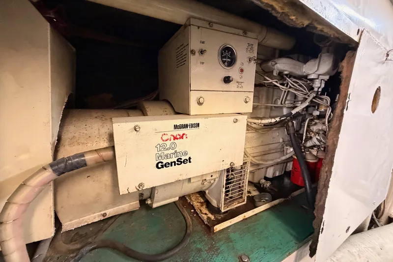 Slide: The Image of Engine room of 1984 Hartman-Palmer 60 Flush Deck Motor Yacht with McGraw-Edison Marine GenSet. - 132