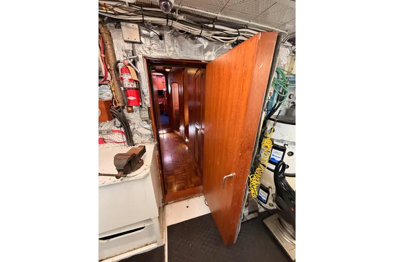Slide: The Image of Engine room entrance of 1984 Hartman-Palmer 60 Flush Deck Motor Yacht. - 141