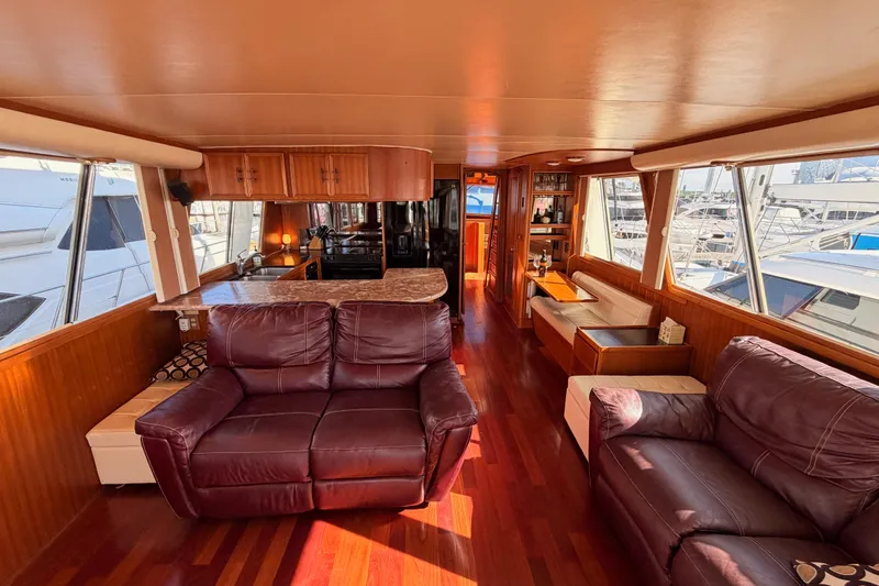 Slide: The Image of Luxurious interior of 1984 Hartman-Palmer 60 Flush Deck Motor Yacht with leather seating and wood finishes. - 15