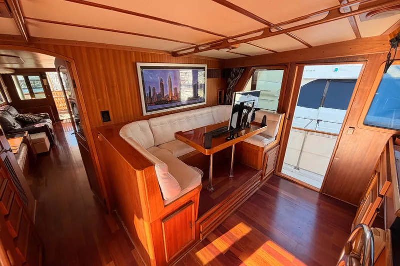 Slide: The Image of Luxurious 1984 Hartman-Palmer 60 Flush Deck Motor Yacht interior with elegant wood finish. - 30