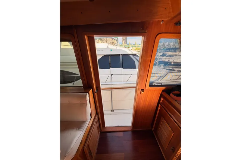 Slide: The Image of Interior view of 1984 Hartman-Palmer 60 Flush Deck Motor Yacht with wooden finish. - 31