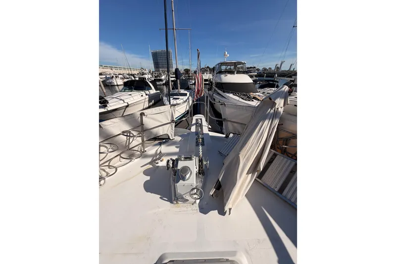 Slide: The Image of 1984 Hartman-Palmer 60 Flush Deck Motor Yacht docked in marina, sunny day. - 33