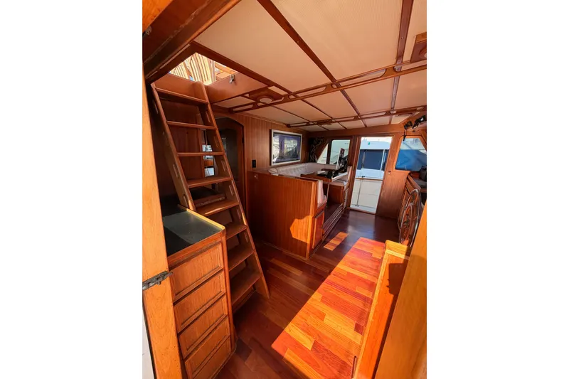 Slide: The Image of Interior of 1984 Hartman-Palmer 60 Flush Deck Motor Yacht with wooden finishes. - 39