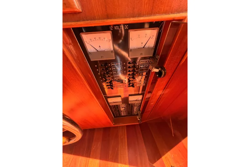 Slide: The Image of Electrical panel of 1984 Hartman-Palmer 60 Flush Deck Motor Yacht with gauges and switches. - 42