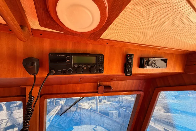 Slide: The Image of Interior of 1984 Hartman-Palmer yacht with radio equipment and wooden paneling. - 47